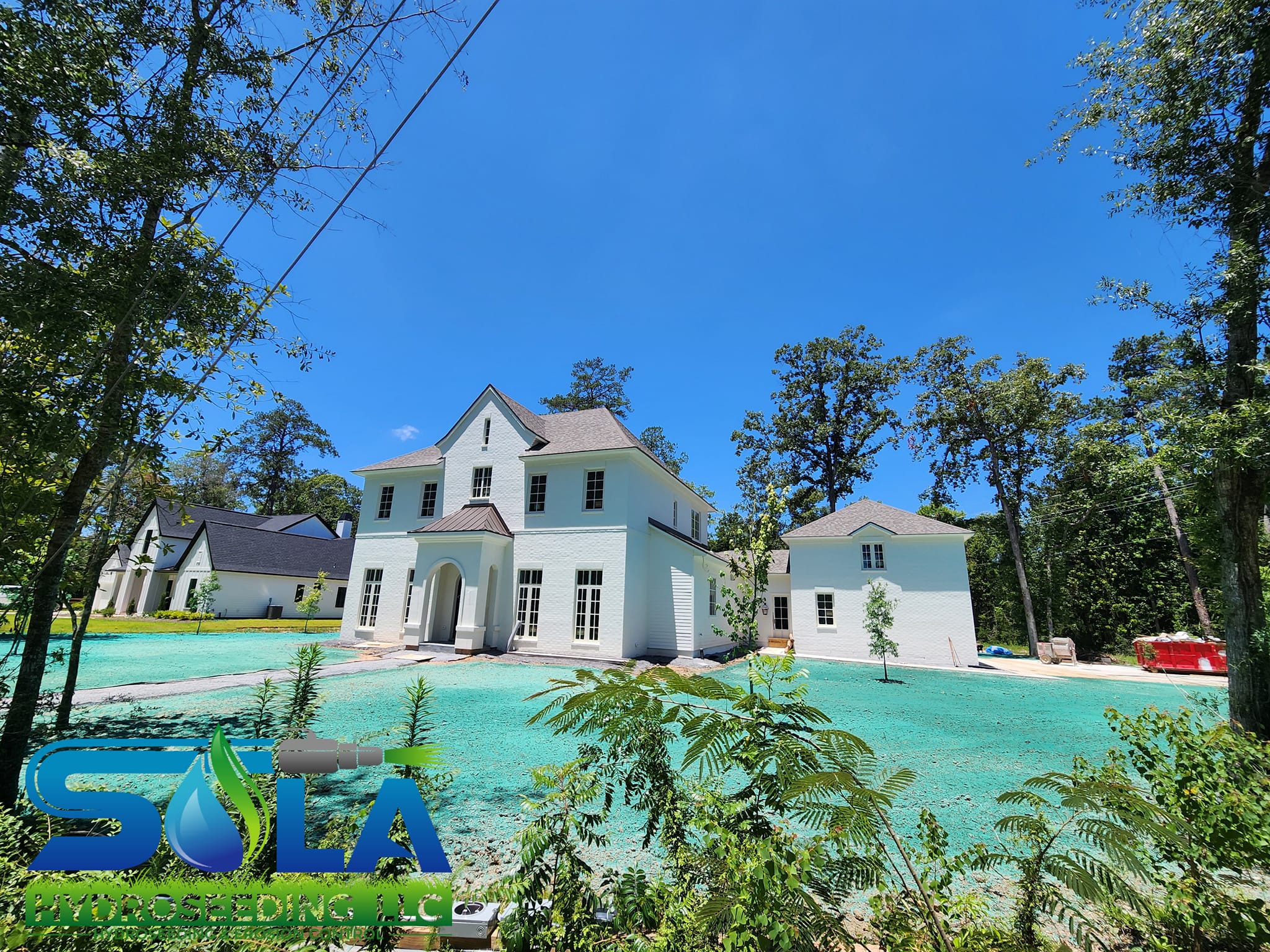 Fresh hydroseed application around a Mandeville-area home