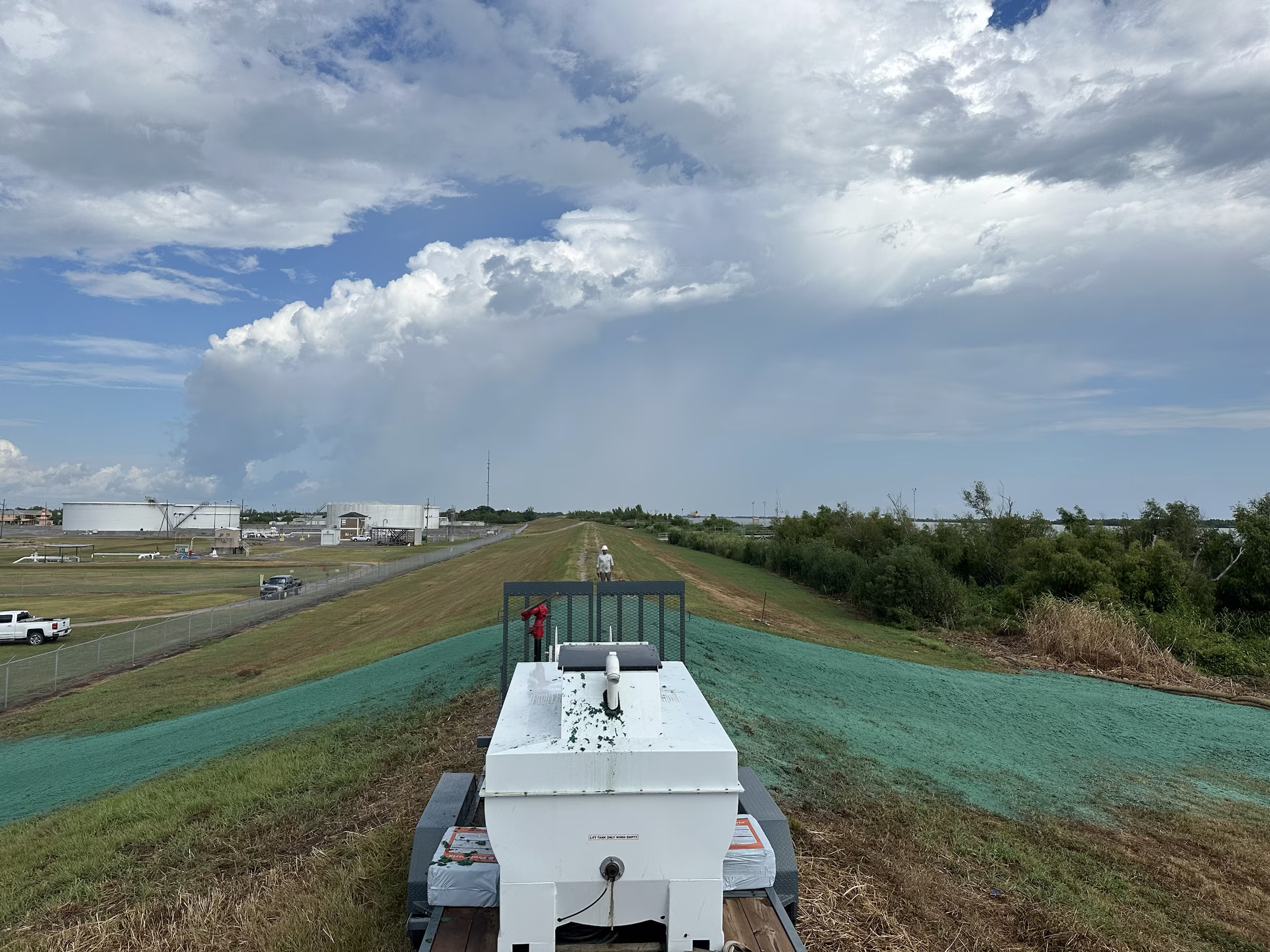 Hydroseed application underway at a levee project in Venice, Louisiana